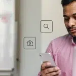 Fotomontagem de homem observando a tela de seu celular, com ícones de busca e de finanças na imagem. que ilustra este artigo sobre o melhor banco digital para abrir conta PJ
